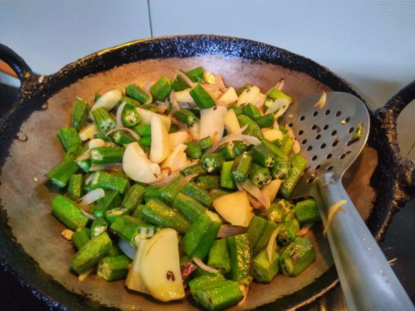 Add Ladyfinger and Potatoes and saute them for 1-2 mins. Add Turmeric, Red Chilli, Coriander Powder and Salt saute them for atleast 2-3 mins.